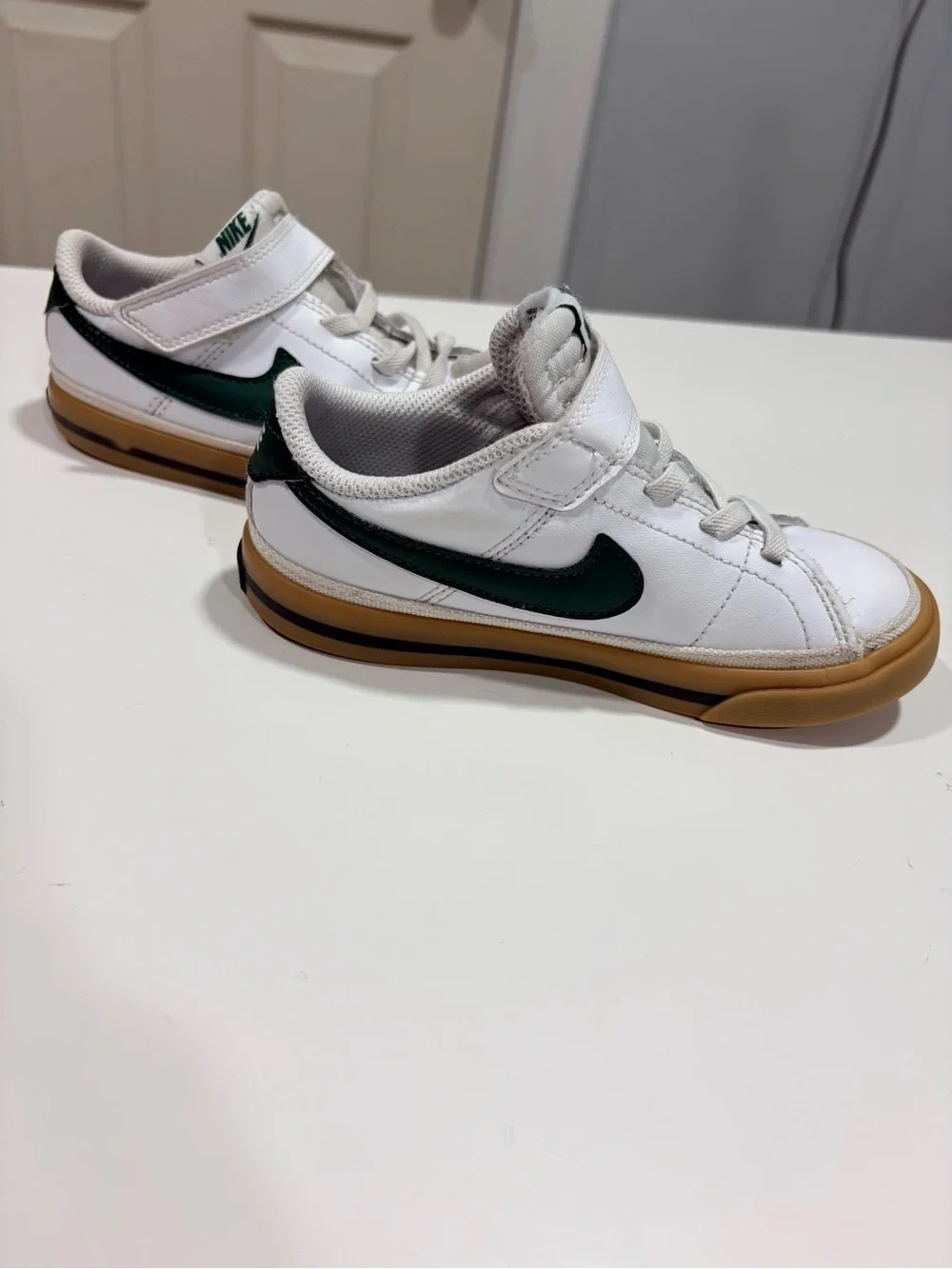 Nike Kids White Sneakers with Green Swoosh and Gum Sole